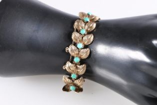 9ct gold leaf design bracelet set with turquoise cabochons, makers mark 'HB', 18.9g gross.