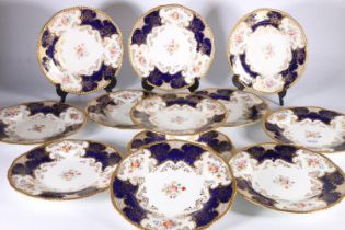 Set of twelve Coalport English porcelain cobalt blue and gilt hand-painted floral batwing pattern '