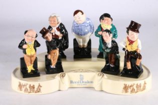 Royal Doulton The Pickwick Collection comprising seven figurines to include Mr Pickwick, Buz Fuz,