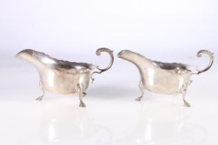 Pair of silver sauce boats with acanthus leaf scroll handles by J B Chatterley & Sons Ltd, London