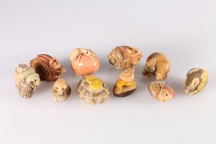 Ten coloured resin netsuke including snake, dragon, walrus, rat, tortoise, etc.