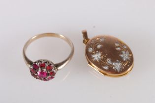 9ct yellow and white gold pendant locket 2.2g gross and a yellow metal ring set with ten ruby pink