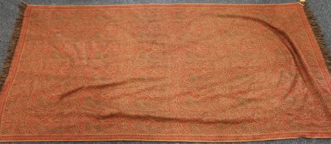 Paisley patterned shawl of typical style, the red ground decorated with boteh, 200cm x 100cm.