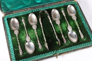 Late Victorian set of six silver apostle spoons with angels above bowls, along with sugar tongs