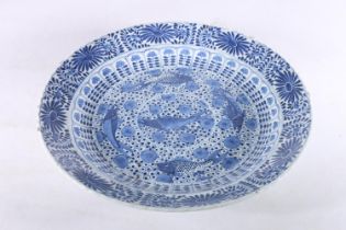 Chinese blue and white porcelain charger dish decorated with fish and floral design, four