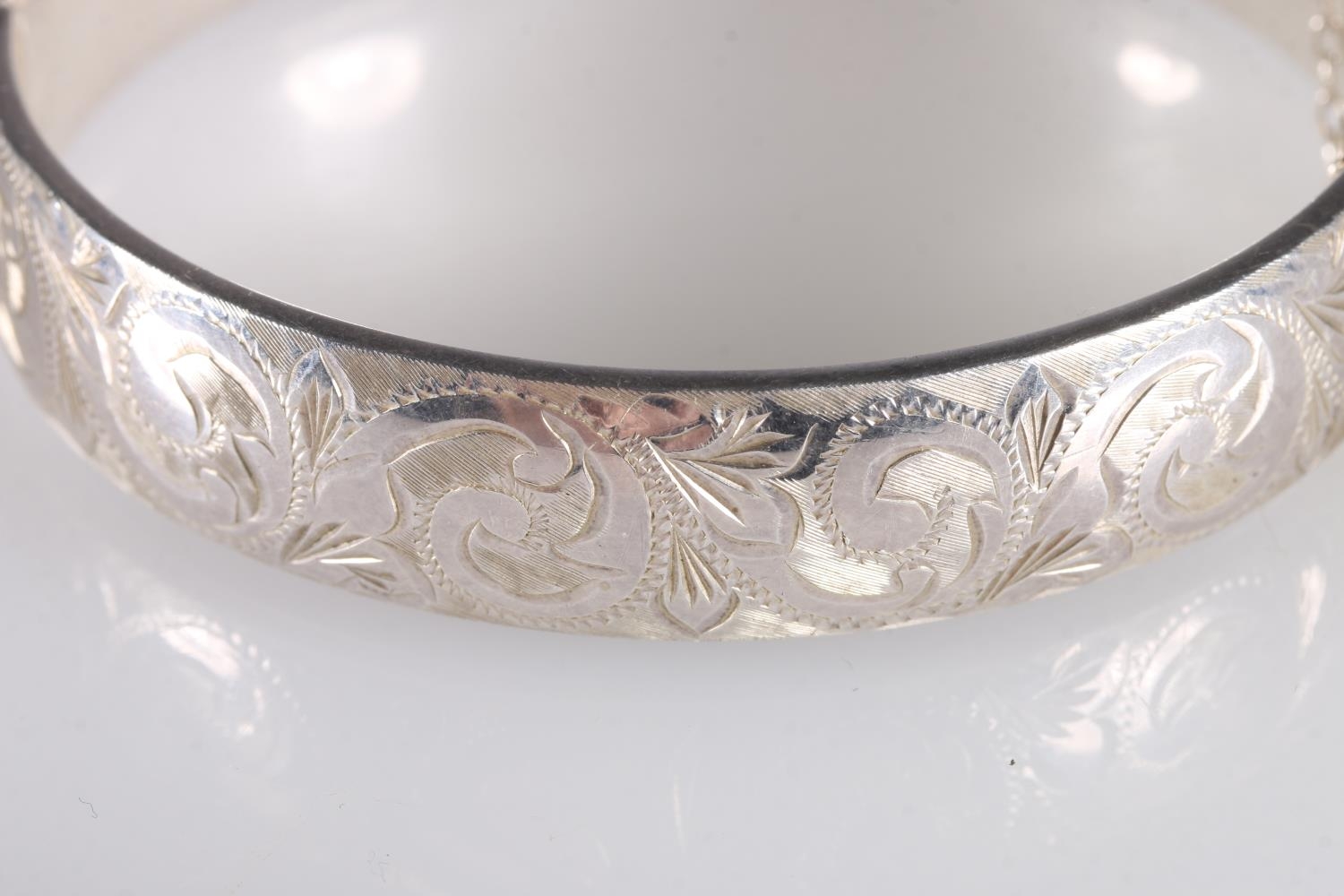 Georg Jensen hinged bangle with foliate decoration to one side hallmarked GJLd, london 1964, 6cm, - Image 4 of 4