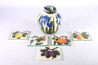 Five Griselda Hill Wemyss pottery tiles of fruit design, 10cm x 10cm and a floral pattern ginger jar