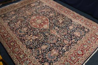 Persian Khorasan style rug, the dark-coloured field with central leaf shaped panel surrounded by