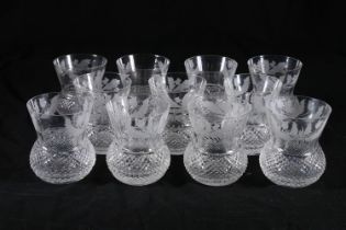 Set of eleven Edinburgh Crystal thistle shaped drinking glasses with etched thistle pattern,