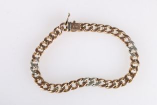 8ct gold curb link bracelet set with diamond chips, the clasp stamped '333',12.4g gross.