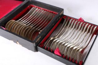 Set of twelve 800 grade silver table forks and knives, 22cm, most marked Doudin, in original canteen