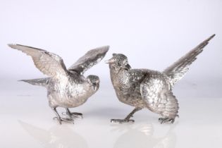 Pair of hollow cast silver table models of pheasants, by C J Vander Ltd, London 1969, 30cm long,