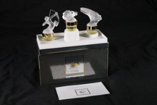 Lalique of France, three frosted glass perfume bottles from the 'Flacons Collection Mascottes'