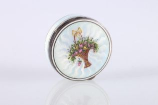 Continental silver and guilloche enamel circular pill box, the hinge top decorated with basket of