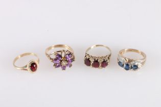 Four 9ct gold dress rings, 14.6g gross.