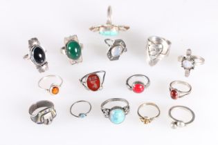 Fifteen contemporary silver and other dress rings, all unmarked but many certainly the work of