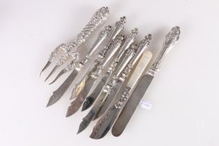 Set of six Italian 800 grade silver fish or fruit knives with mask terminals, an ornate silver