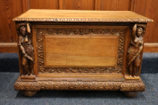 Antique Italian walnut cassone type hinged top blanket box, the front with fielded panel flanked