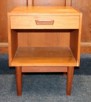 Gunnar Nielsen Tibergaard for Tibergaard of Denmark, a teak bedside cabinet raised on tapering