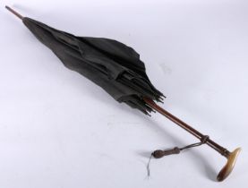 Antique parasol or umbrella, the horn handle possibly Rhino horn, 77.5cm long.