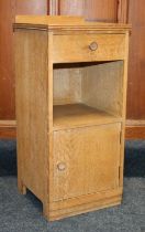 Heals of London, a limed oak ledge back bedside cabinet, Heals button to the inside of the drawer,