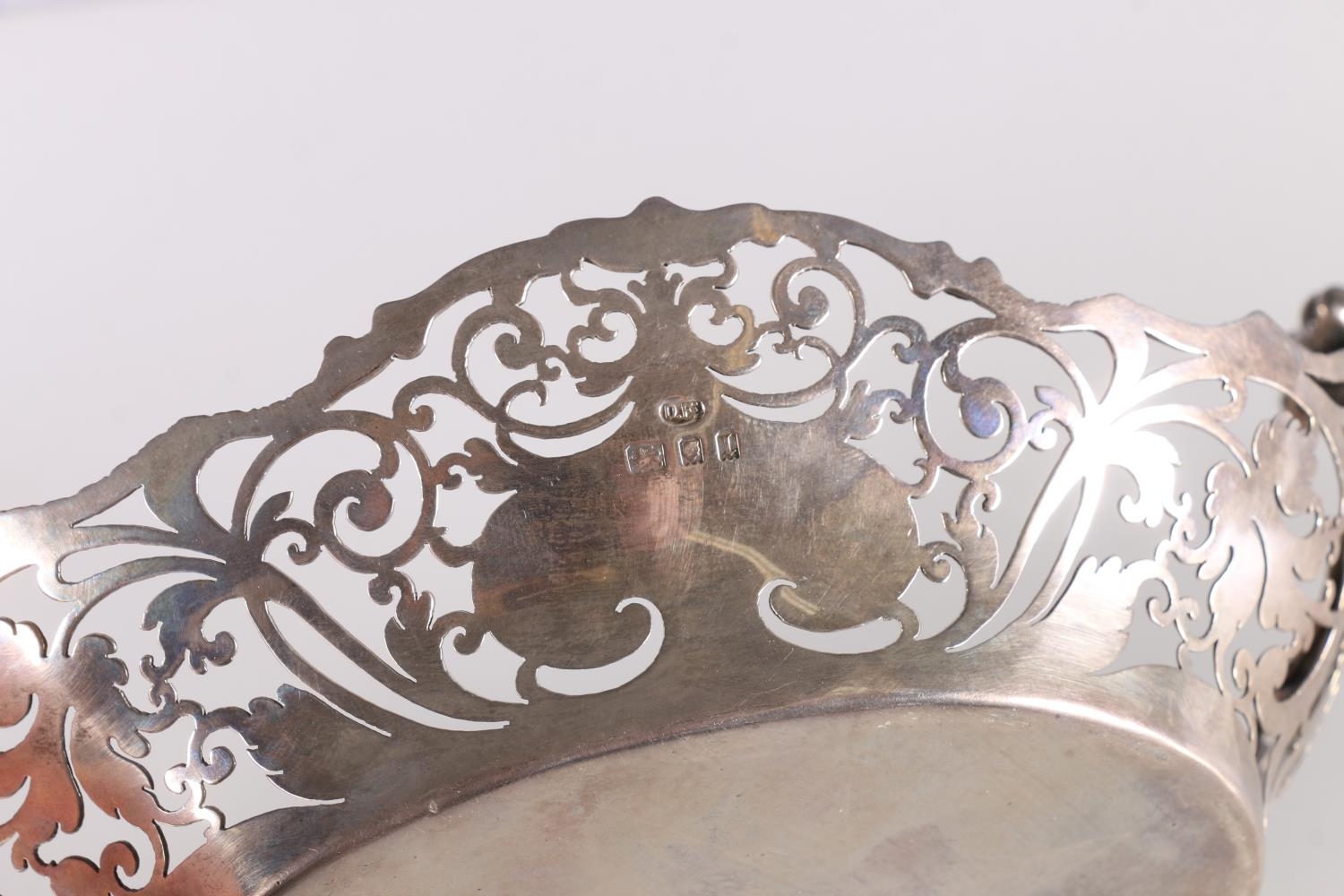 George V silver dish of oval form with pierced sides and two scroll handles, by Josiah Williams & Co - Image 3 of 3