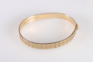 Contemporary 9ct gold bangle with cross design, makers Maylin Products Ltd of London, further