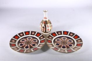 Pair of Royal Crown Derby bone china cabinet plates decorated with Old Imari pattern 1128, date