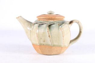 RICHARD BATTERHAM (1936-2021), a cut sided studio pottery ash glazed stoneware teapot, 12cm tall,