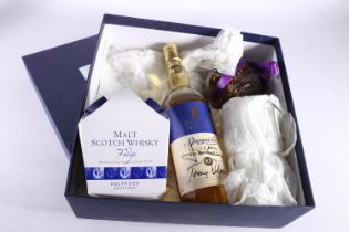 THE SCOTTISH PARLIAMENT gift box containing a bottle of Speyside 12-year-old single malt Scotch