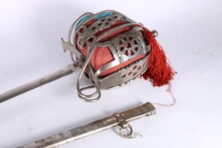 Scottish regimental basket hilted broad sword, the etched blade with double fullers, steel guard