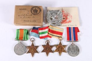 WWII war medals including Defence medal, WWII war medal, Africa star, Italy star and 1939-1945 star,