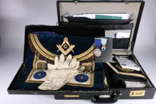 Masonic interest, a briefcase containing Lodge Waverley 697 jewel, two aprons, cuffs, ephemera etc.