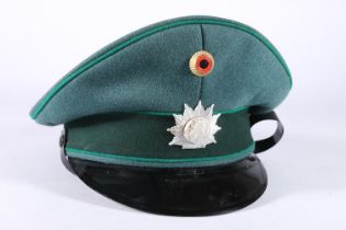 German Police cap with North Rhine Westphalia coat of arms cap badge, the interior with label for