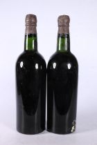 Two bottles of COCKBURN's 1955 vintage port, no lables, the capsules 'John Harvey & Sons Ld