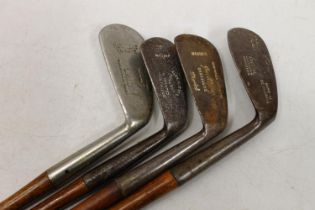 Four hickory shafted golf clubs including James Murry of Carnoustie special mashie, Alex Aitken of