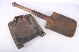 Entrenching spade with leather carrier, 53cm long.