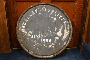 Whisky barrel or cask head and top rung 'MACALLAN GLENLIVET DISTILLERY 1999'.