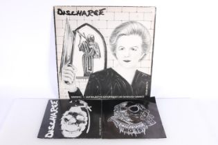 Discharge Warning Her Majesty's Government Can Seriously Damage Your Health Punk album and two