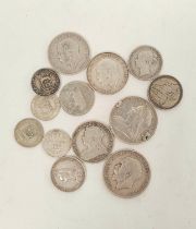 United Kingdom & World. Group of mostly 925 silver coins to include an 1879 Shilling, 1898 Florin,