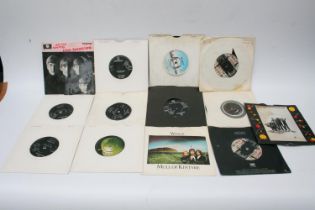Collection of singles to include Beatles and Beatles related singles, All My Loving, Listen To