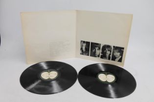 Beatles White Album reissue number 237741 to the front cover with inners to include