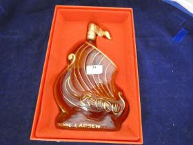 Larsen Viking Ship "Invincible" Fine Champagne Cognac, contained in a viking shaped glass decanter