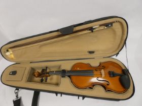 3/4 length students violin in fitted case and bow.