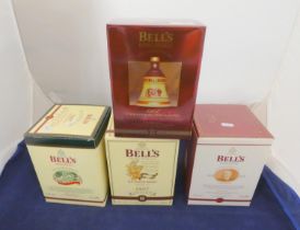 Three Bell's extra special old scotch whisky decanters with contents, Dated 1996, 1997, 1998, with