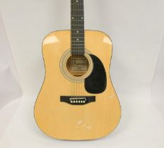 Falcon six string acoustic guitar , model FG100N.