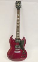 Encore six string electric guitar in maroon colour, 100cm in length.