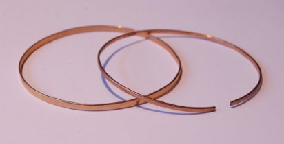 Two gold slave bangles, '9ct', 10.5g.