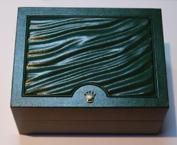 Rolex green tooled watch box with gilt crown emblem to the top of the box, marked Rolex to the