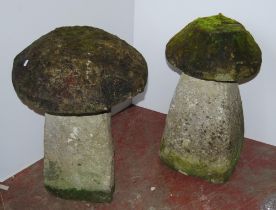Near-pair of antique garden stoneware staddle stones, each with a heavy mushroom-shaped top on